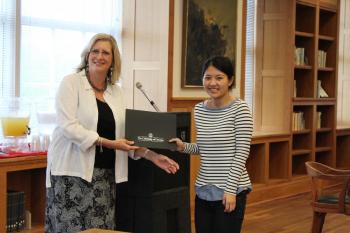 Ada Guan receives an award