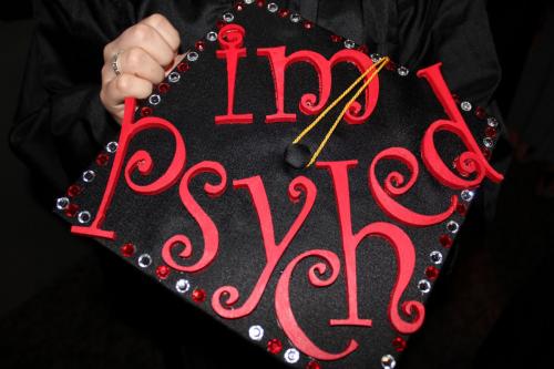 Decorated graduation cap reading "I'm psyched"