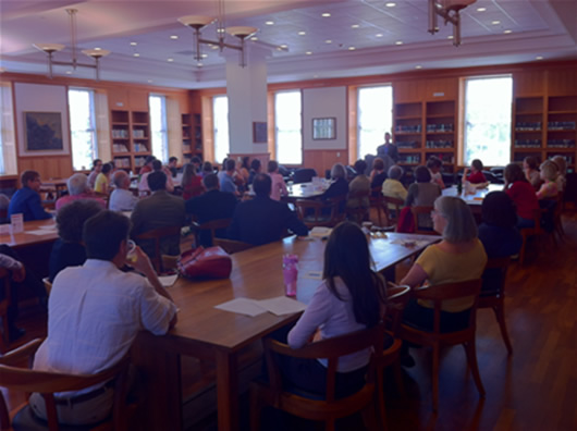 Students and faculty listening to Dr. Campbell speak