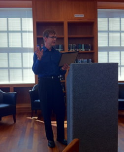 Dr. Randy Hammond presenting an award