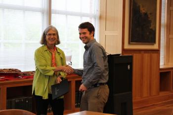 Grad Student David parker receives an award