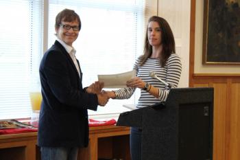 An award winner receives an award