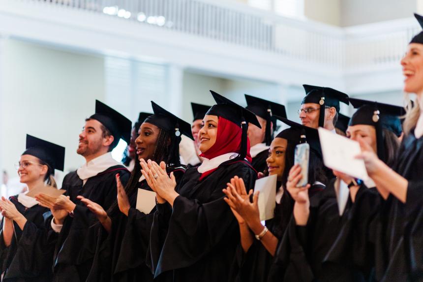 IOMP Graduate Students Clapping
