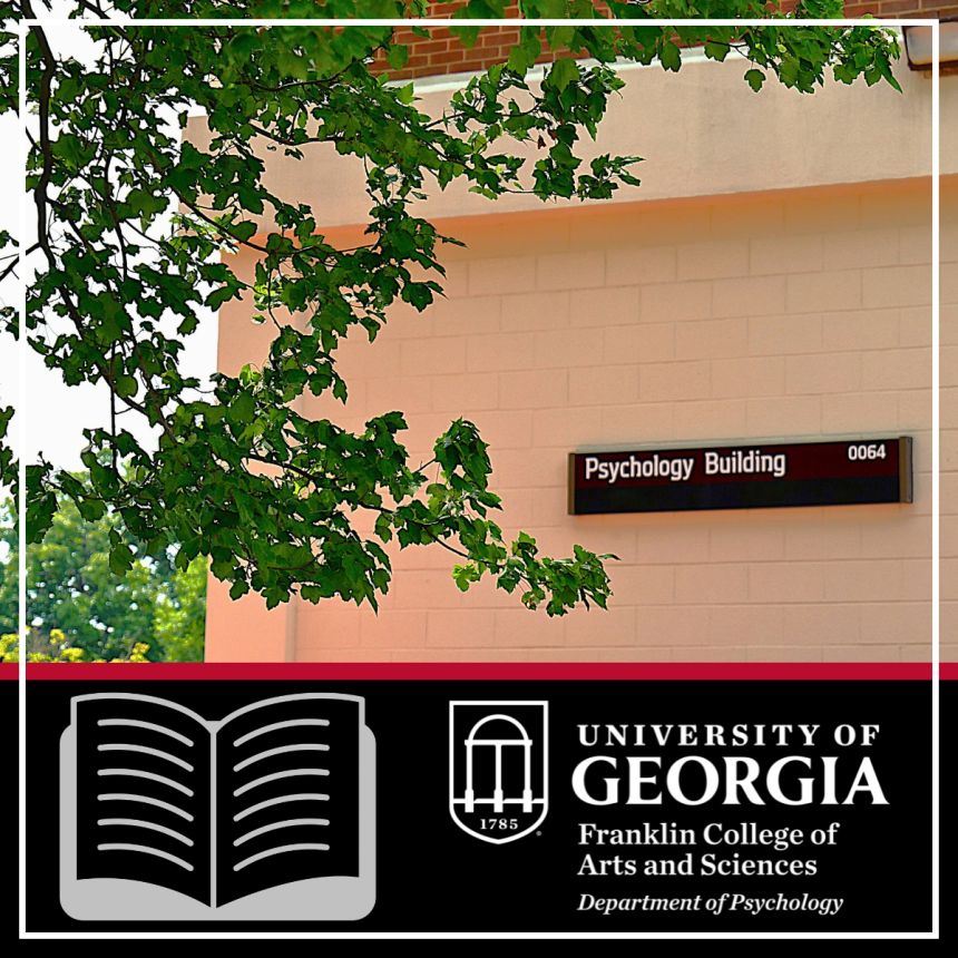 Photo of the Psychology Building sign with the university logo and a image of a book at the bottom.