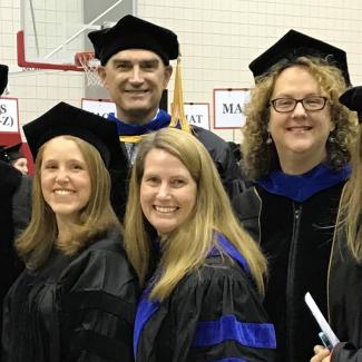 BBS Faculty and PhD Graduates Pose for a Photo