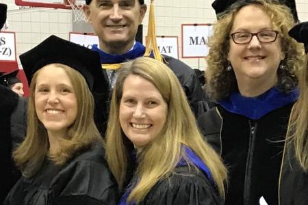 BBS Faculty and PhD Graduates Pose for a Photo